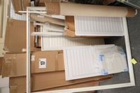 Lot 17 - QTY OF LOUVER BLINDS LEANING AGAINST WALL, INC. SOME IN CARDBOARD BOXES - VARIOUS SIZES (VAT applicable)