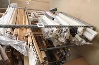Lot 42 - GALVANISED 3-HEIGHT, 4-WHEEL STOCK RACK & CONTENTS OF 1 RACK OF VARIOUS ROMAN STYLE BLINDS (VAT applicable)