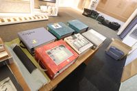 Lot 81 - 51INCH BEECH DESK COMPLETE WITH ROLLER BLIND SAMPLE, 6 LARGE SAMPLE BOOKS & 2 BLACK BAGS (VAT applicable)