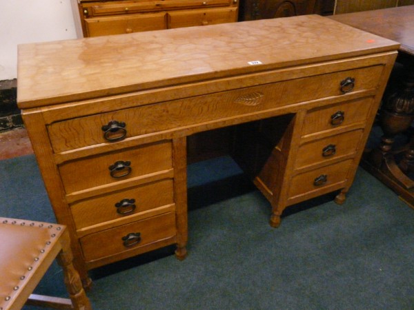 Solid oak writing desk and chair - Sold for Â£390.00.